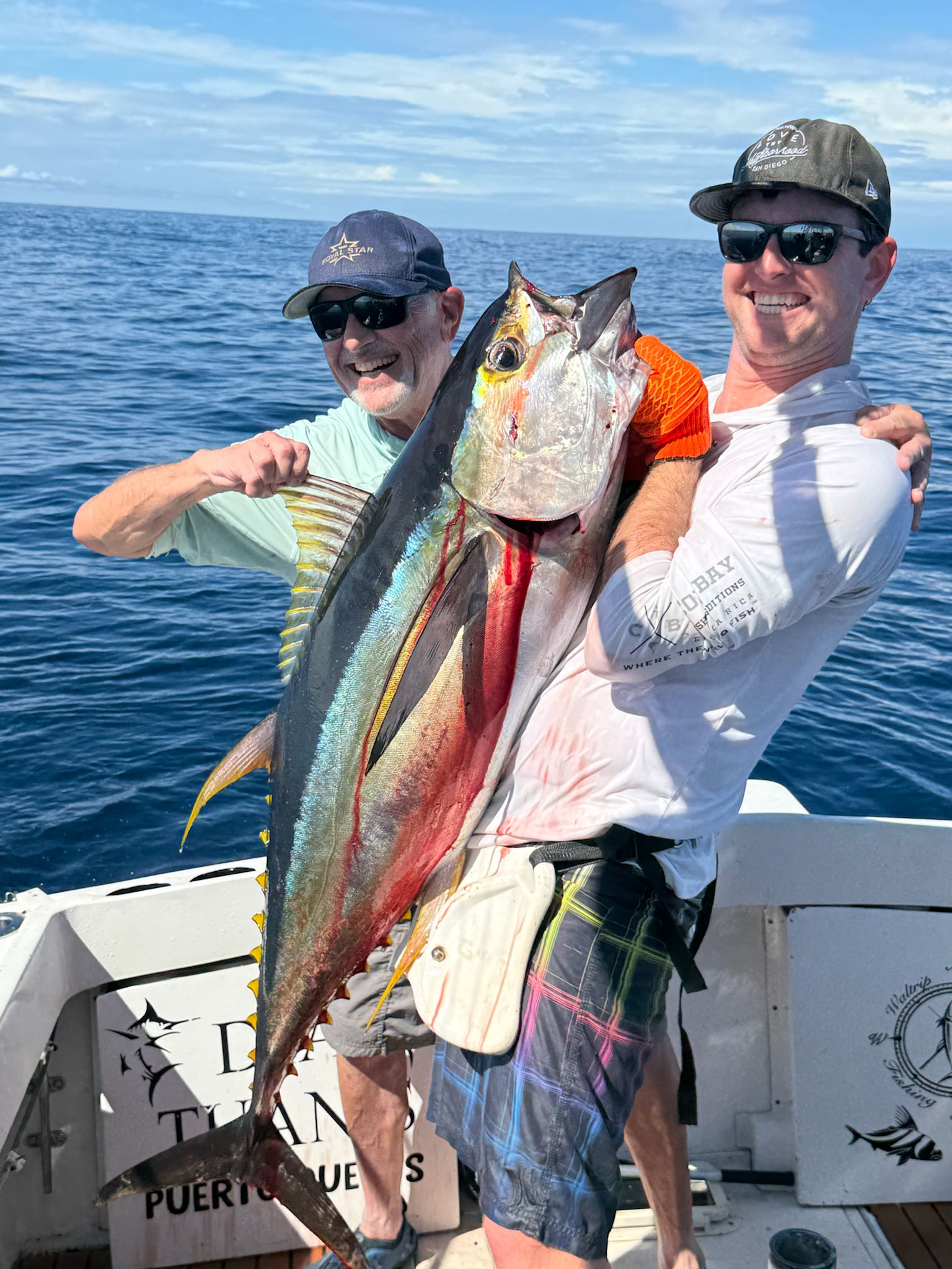 Two anglers with yellowfin tuna catch