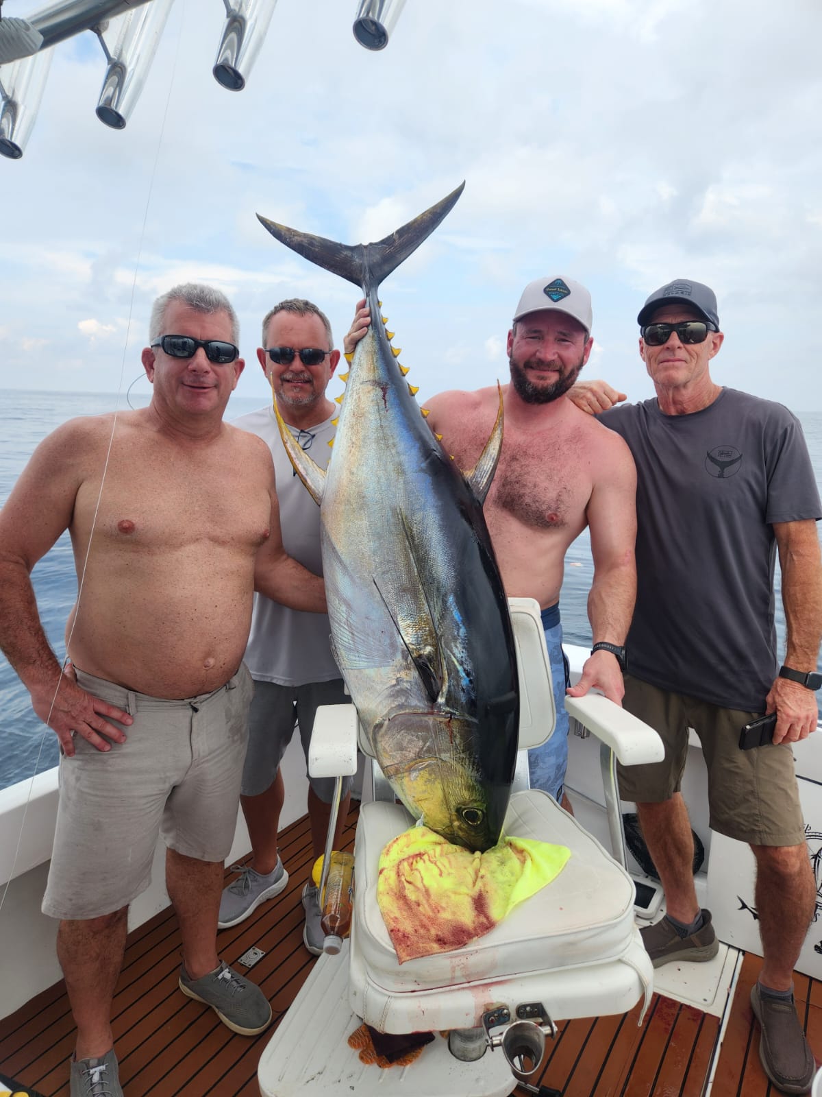 Group of four with yellowfin tuna