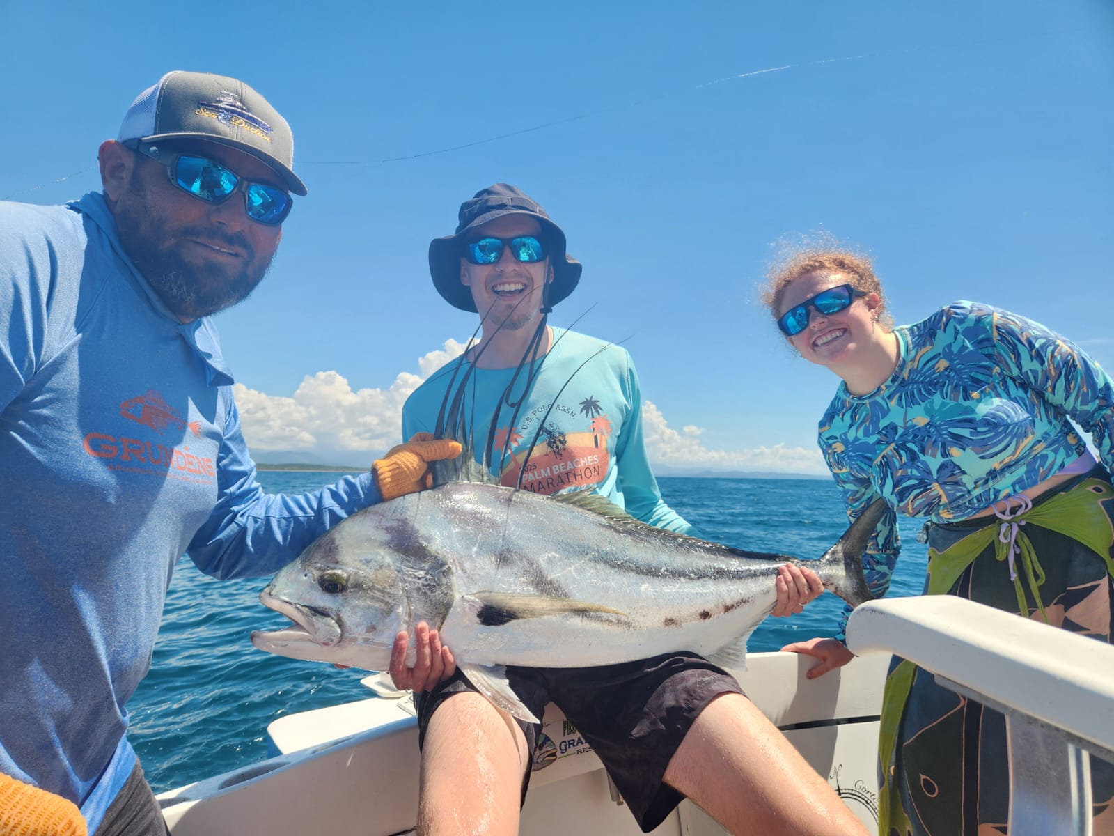 Three anglers with permit