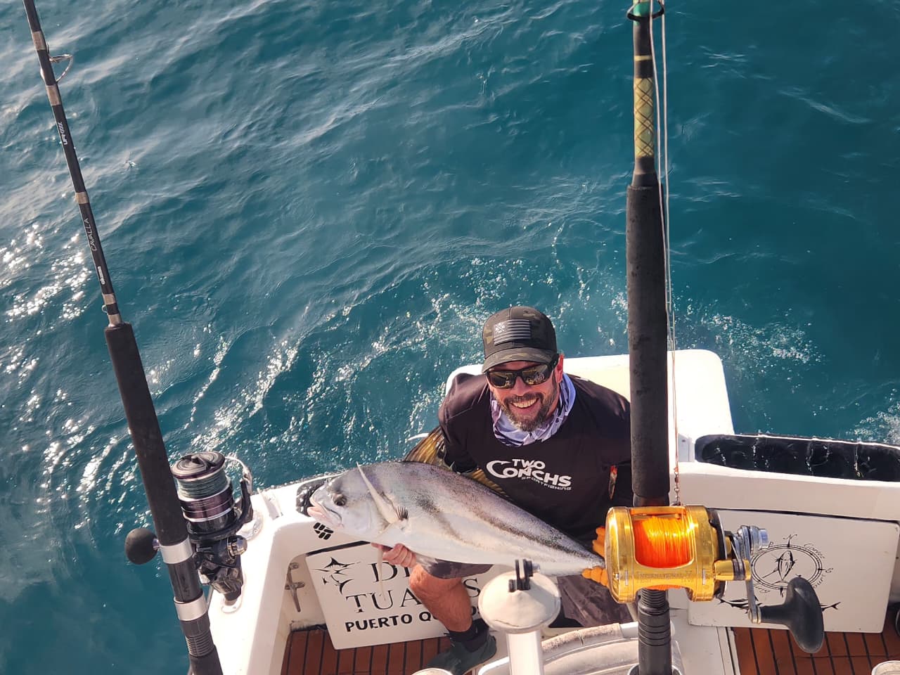 Smiling angler with roosterfish